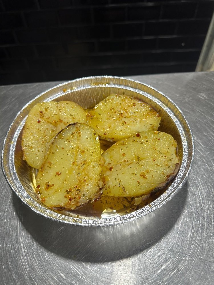 Patatas asadas en tarrina